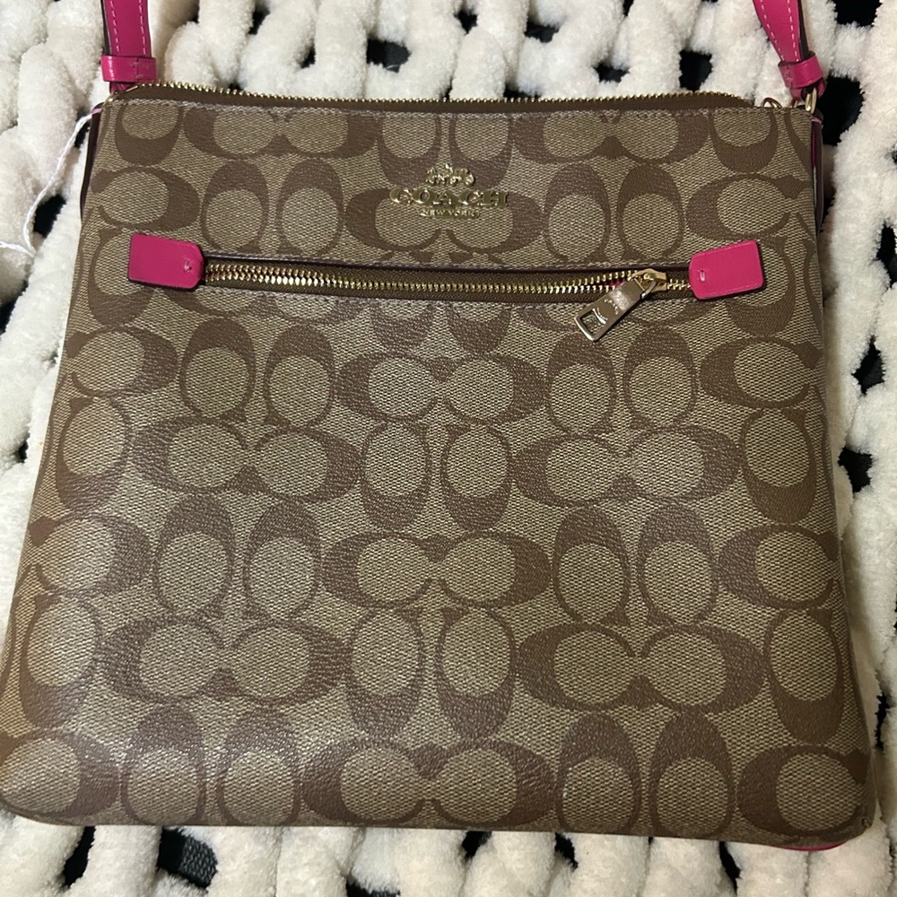🚨🚨🚨SOLD🚨🚨🚨Coach Brown and Pink Crossbody Bag
Preloved excellent condition